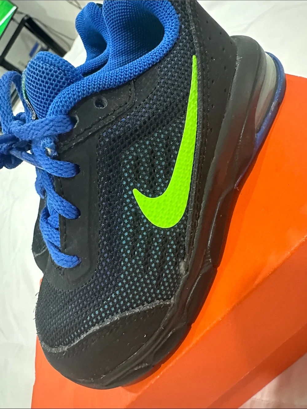 Nike Kids Black and Blue Athletic Sneakers with Neon Logo